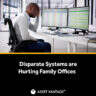 A man overwhelmed by complex data on computer screens shows struggles of fragmented tools. Text reads Disparate Systems are Hurting Family Offices from Asset Vantage, highlighting system inefficiency