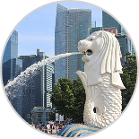 Merlion statue in Singapore spouting water with modern skyscrapers in the background. Located at Marina Bay, this iconic landmark represents Singapore’s blend of tradition and innovation.